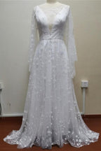 Robe de mariée bohème trapèze à manches longues et dos nu en dentelle
