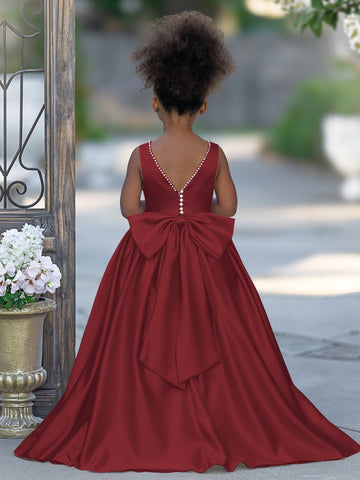 Vestido rosa sin mangas de satén con escote con cuentas y detalle de lazo 