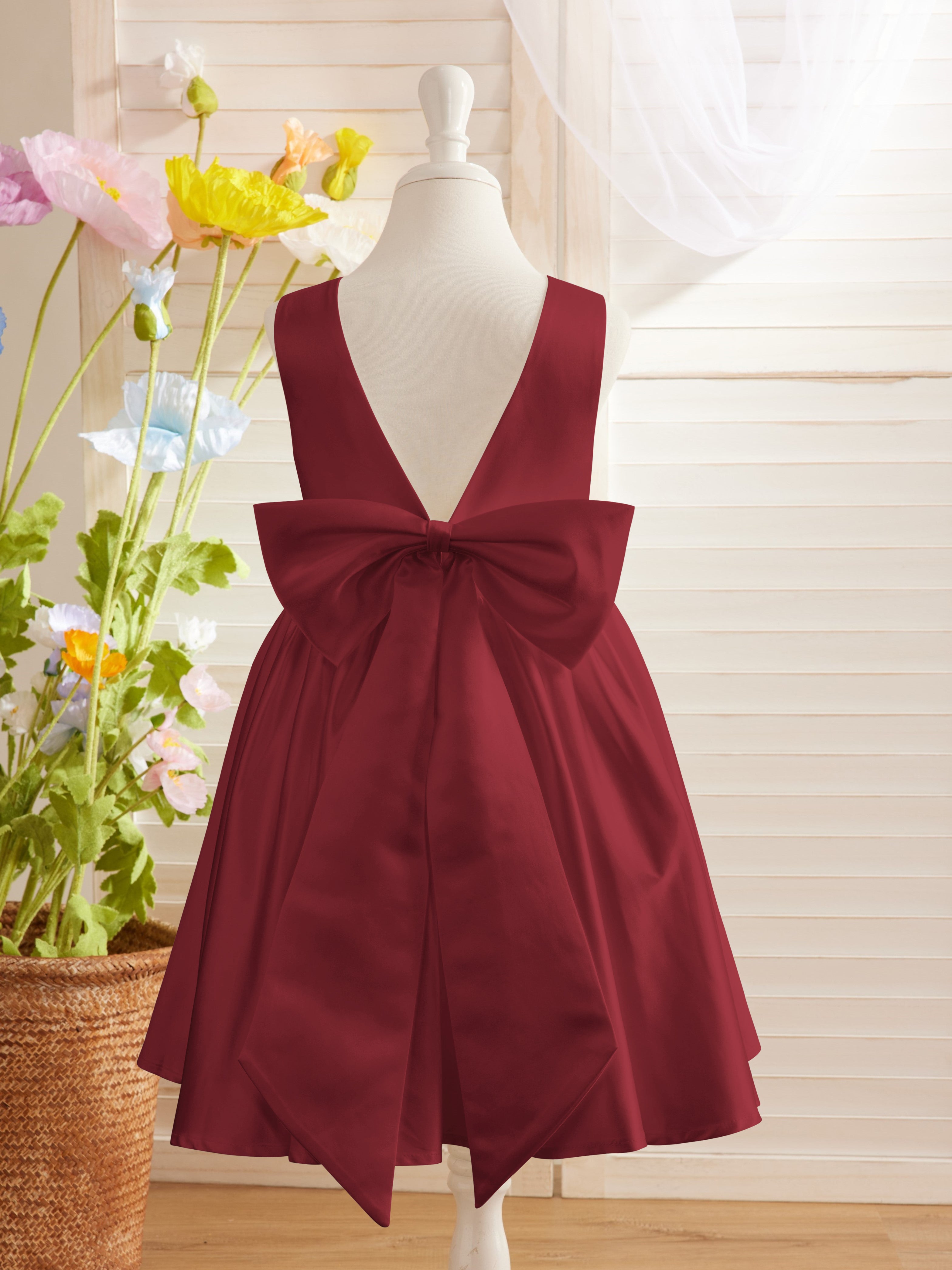 Elegante vestido de niña de las flores de satén con corte en A, espalda en V y lazo, hasta la rodilla 