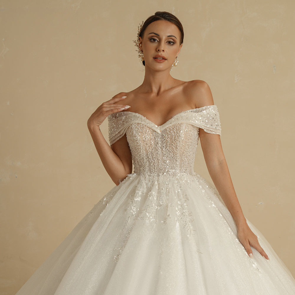 Robe de mariée princesse ivoire ornée de perles, épaules dénudées, sans manches, à paillettes, style bal de princesse 