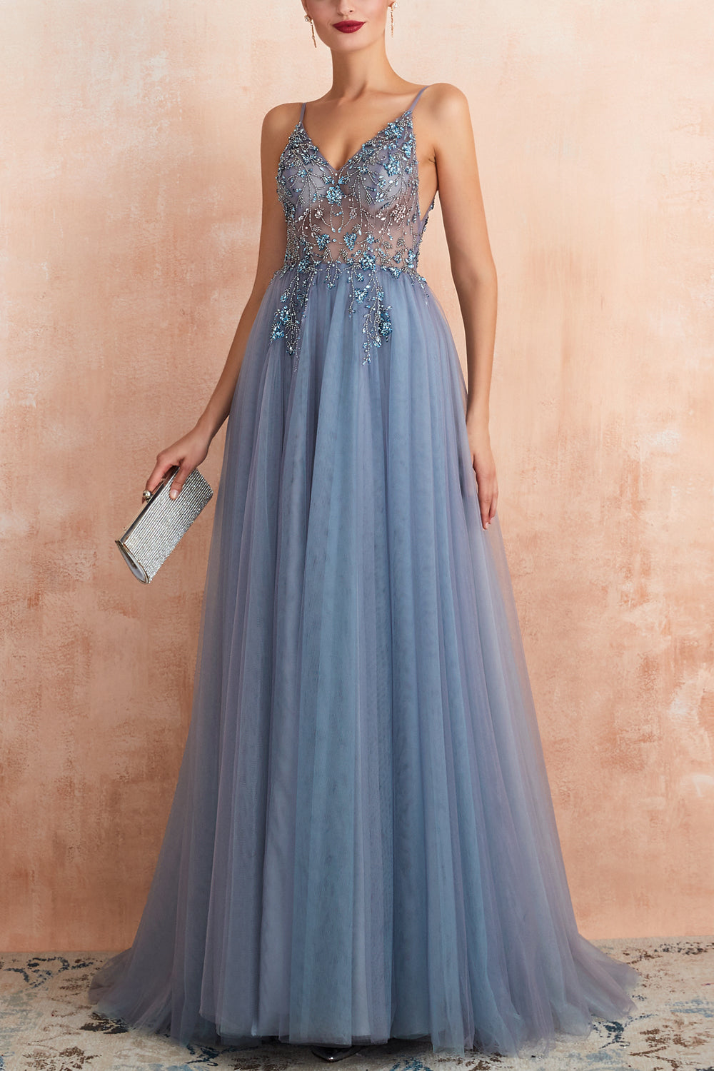 Robe de bal longue bleue à fines bretelles et fente
