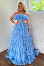 Robe de bal longue bleue tendance, sans bretelles, coupe trapèze, ornée de perles