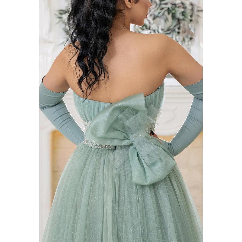 Robe de mariée longue trapèze en tulle froncé à paillettes et sans bretelles