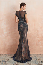Vestido largo de fiesta de sirena con cuentas y mangas cortas
