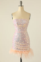 Robe de bal à paillettes et plumes