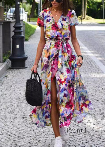 Robe d'été en coton imprimé à col V, taille nouée sur le côté et ouverture latérale. Nouvelle robe d'été en coton imprimé à col V et taille haute. 