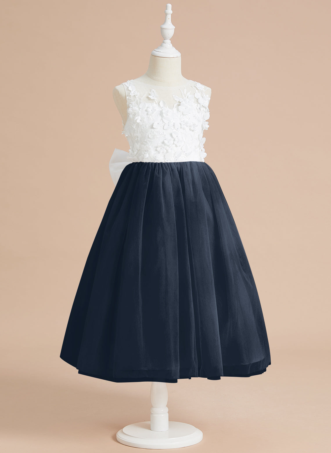 Vestido midi de encaje floral y lazo grande 