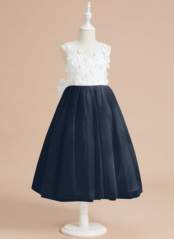 Vestido midi de encaje floral y lazo grande 