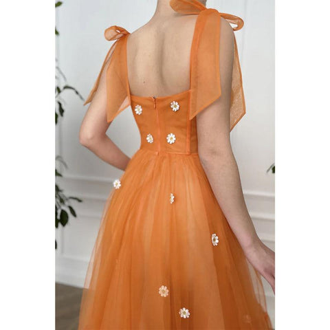 Robe de bal longue trapèze à bretelles spaghetti et décolleté en cœur avec poches 