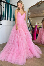 Vestido largo de fiesta rosa con tirantes finos, corte en A y volantes