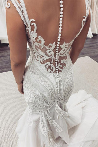 Vestido de novia de sirena con encaje y mangas cortas
