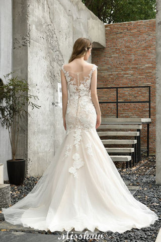 Vestido de novia corte sirena con encaje y mangas casquillo, blanco/marfil, estampado floral.