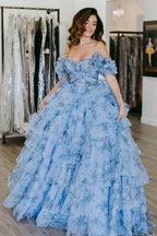 Sigourney | Robe de bal longue trapèze à volants et imprimé floral bleu