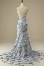 Robe de bal dos nu à fines bretelles ornée de perles