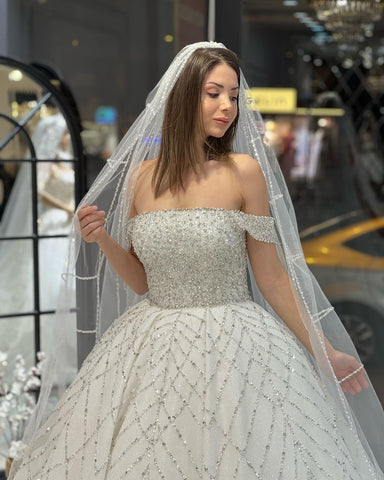 Encantador vestido de novia largo hasta el suelo, corte en A, con lentejuelas y hombros descubiertos, con cola de corte.