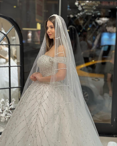 Encantador vestido de novia largo hasta el suelo, corte en A, con lentejuelas y hombros descubiertos, con cola de corte.