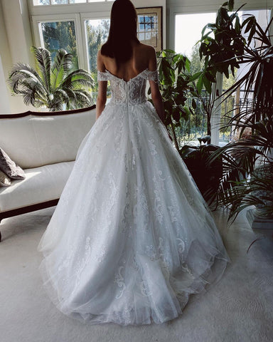 Encantador vestido de novia largo de tul con escote en A, hombros descubiertos y purpurina