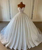 Robe de mariée de bal bustier à sequins sans manches et décolleté cœur, charmante et ravissante.