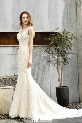 Vestido de novia de sirena sin mangas con escote en V, encaje floral y encantador vestido de novia estilo sirena.