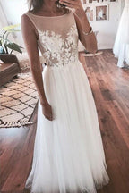 Vestido de novia transparente con apliques de encaje y tul color marfil WD357