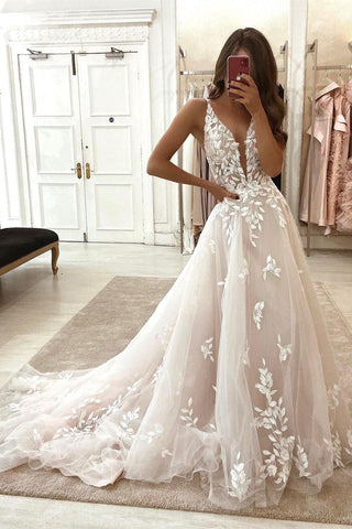 Elegante vestido de novia de corte A con tirantes, escote en V, sin mangas, apliques y encaje.