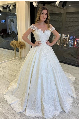 Elegante vestido de novia largo de corte A con hombros descubiertos, apliques de encaje y espalda descubierta