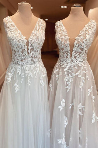 Elegante vestido de novia largo de corte A con escote corazón, apliques de encaje y espalda descubierta