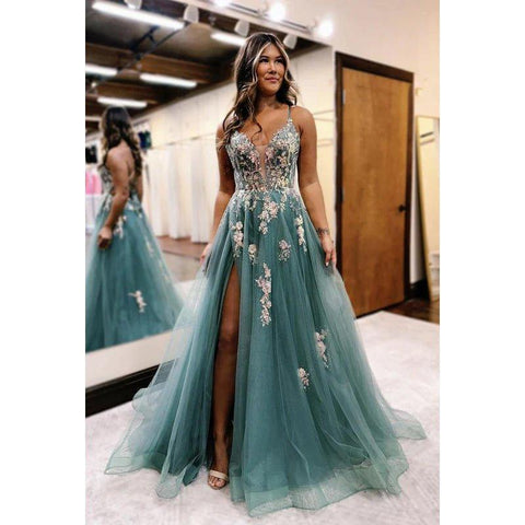 Vestido de fiesta de tul con escote en V, corte A, tirantes cruzados y apliques, de alta costura y ornamentado.