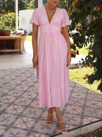 Robe longue oversize à manches bouffantes et col en V 