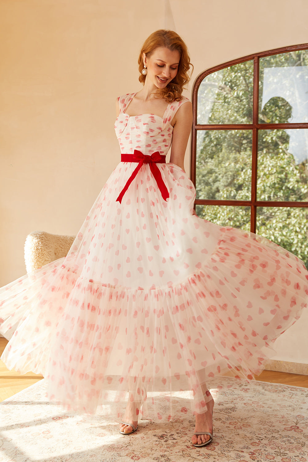 Robe de bal longue princesse trapèze décolleté cœur avec nœud papillon