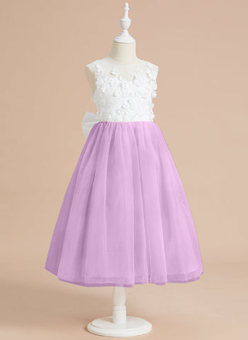 Vestido midi de encaje floral y lazo grande 