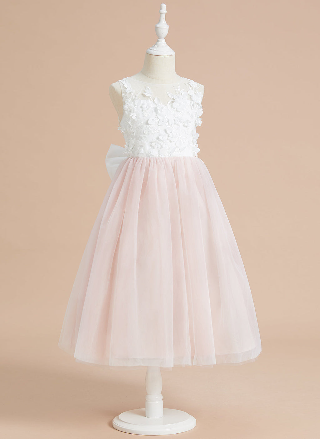 Vestido midi de encaje floral y lazo grande 