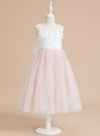 Vestido midi de encaje floral y lazo grande 