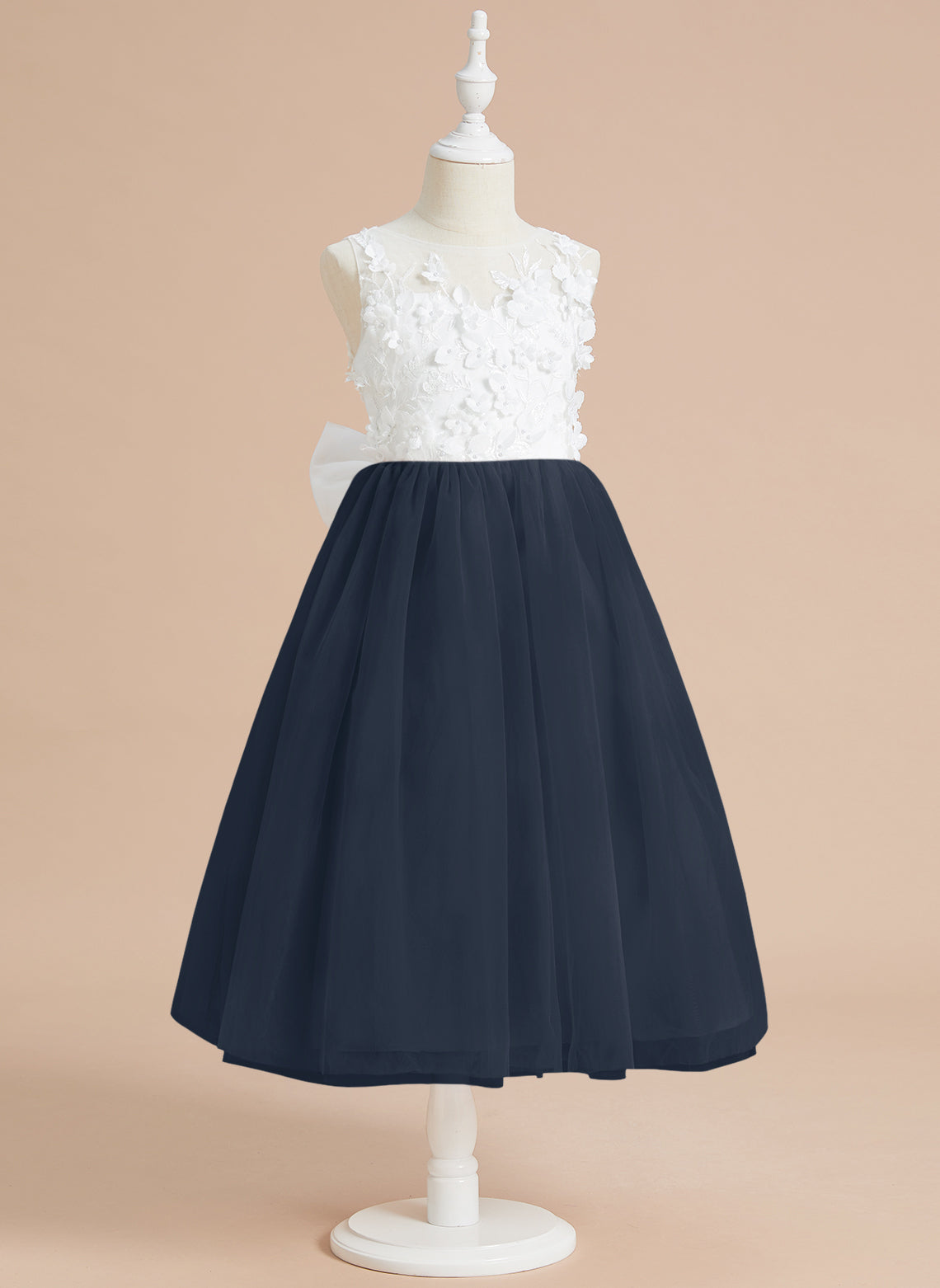 Vestido midi de encaje floral y lazo grande 