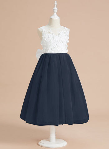 Vestido midi de encaje floral y lazo grande 