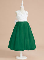 Vestido midi de encaje floral y lazo grande 