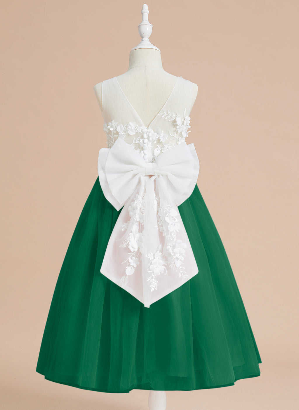 Vestido midi de encaje floral y lazo grande 