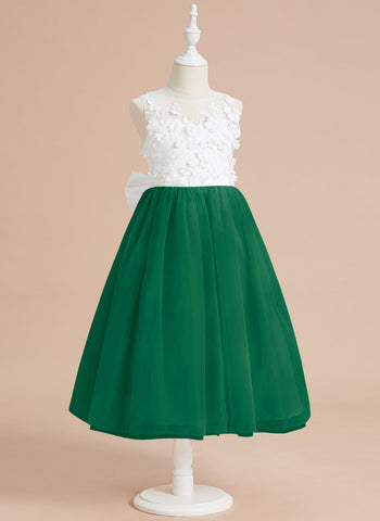 Vestido midi de encaje floral y lazo grande 