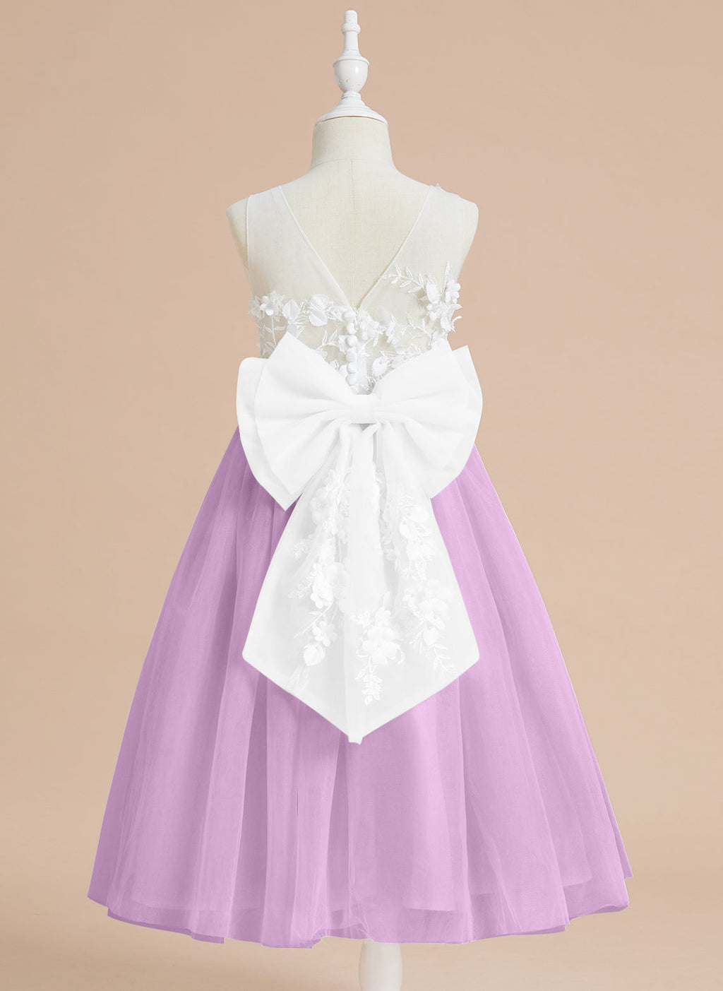Vestido midi de encaje floral y lazo grande 