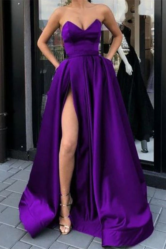 Superbe robe de bal longue trapèze en satin avec fente sur le devant et poches