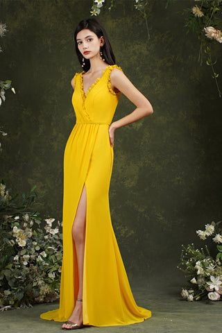 Robe de bal longue sans manches à décolleté plongeant et fente sur le devant