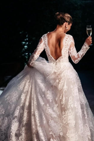 Vestidos de novia de diseñador, corte A, manga larga, espalda descubierta y encaje.