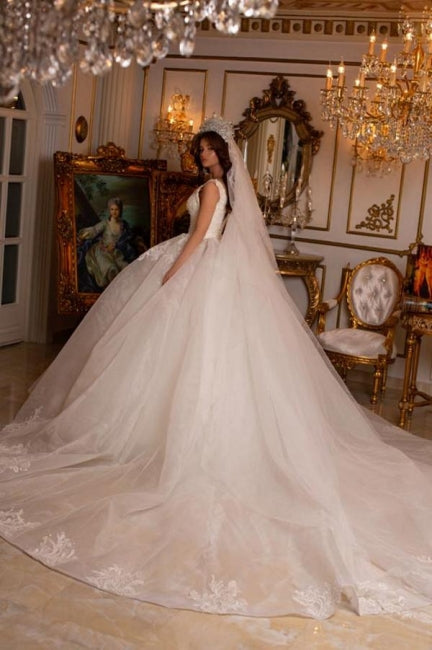 Vestido de novia largo de corte A, sin mangas, con apliques y encaje, de diseñador.