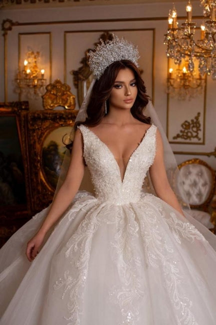 Vestido de novia largo de corte A, sin mangas, con apliques y encaje, de diseñador.