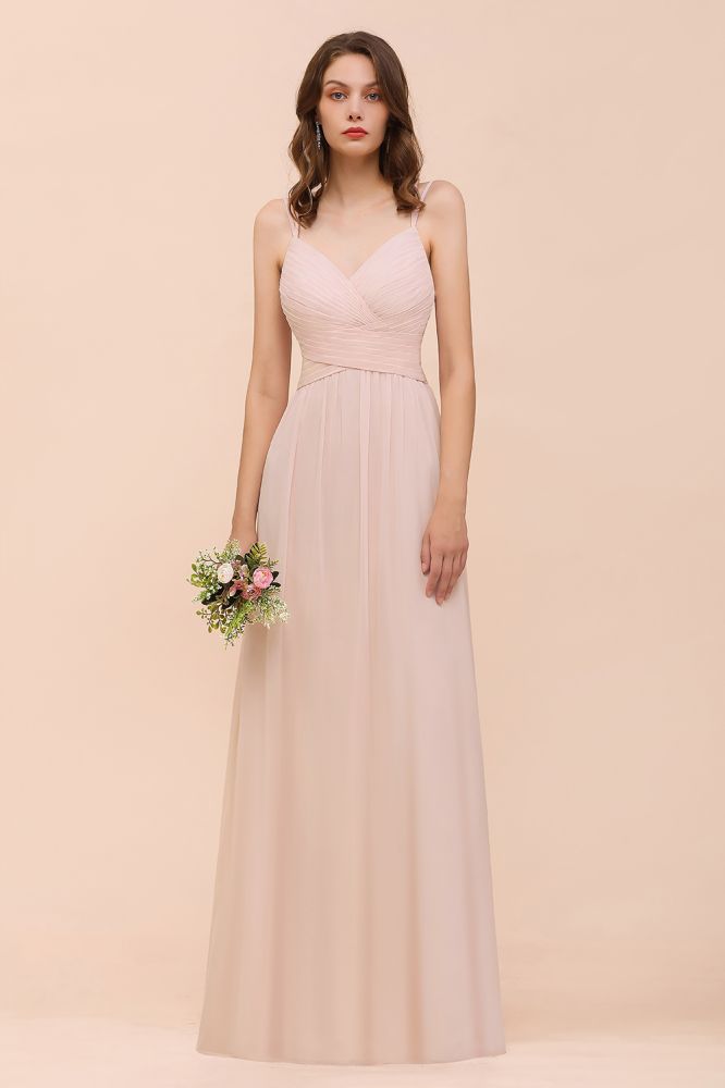 Robe de mariée rose poudré sans manches, coupe trapèze, idéale pour une invitée ou une demoiselle d'honneur de plage