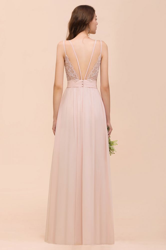 Robe de mariée rose poudré sans manches, coupe trapèze, idéale pour une invitée ou une demoiselle d'honneur de plage