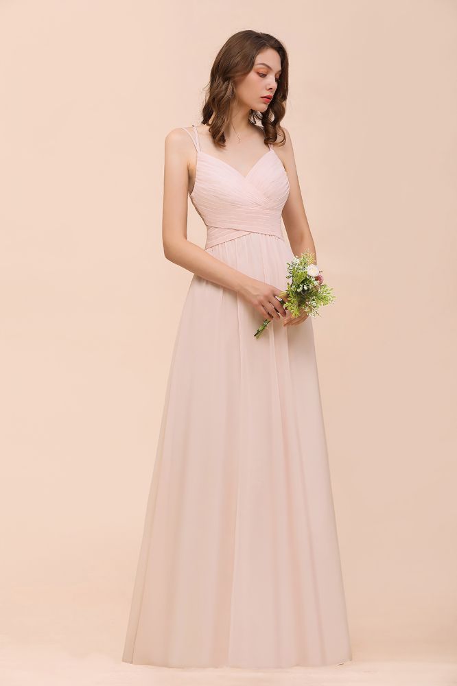Robe de mariée rose poudré sans manches, coupe trapèze, idéale pour une invitée ou une demoiselle d'honneur de plage