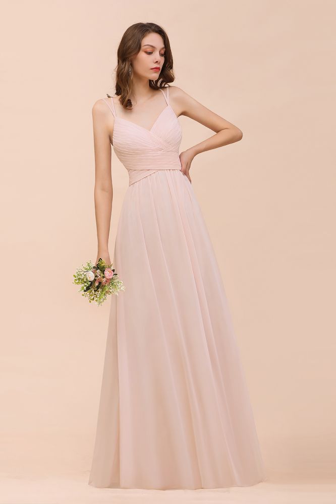 Robe de mariée rose poudré sans manches, coupe trapèze, idéale pour une invitée ou une demoiselle d'honneur de plage