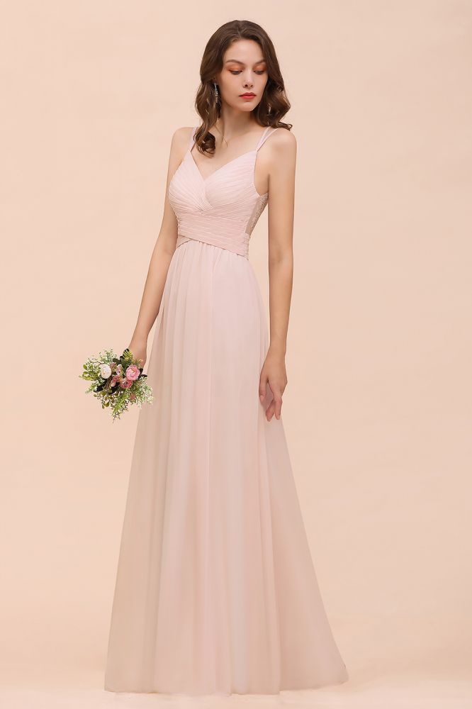 Robe de mariée rose poudré sans manches, coupe trapèze, idéale pour une invitée ou une demoiselle d'honneur de plage
