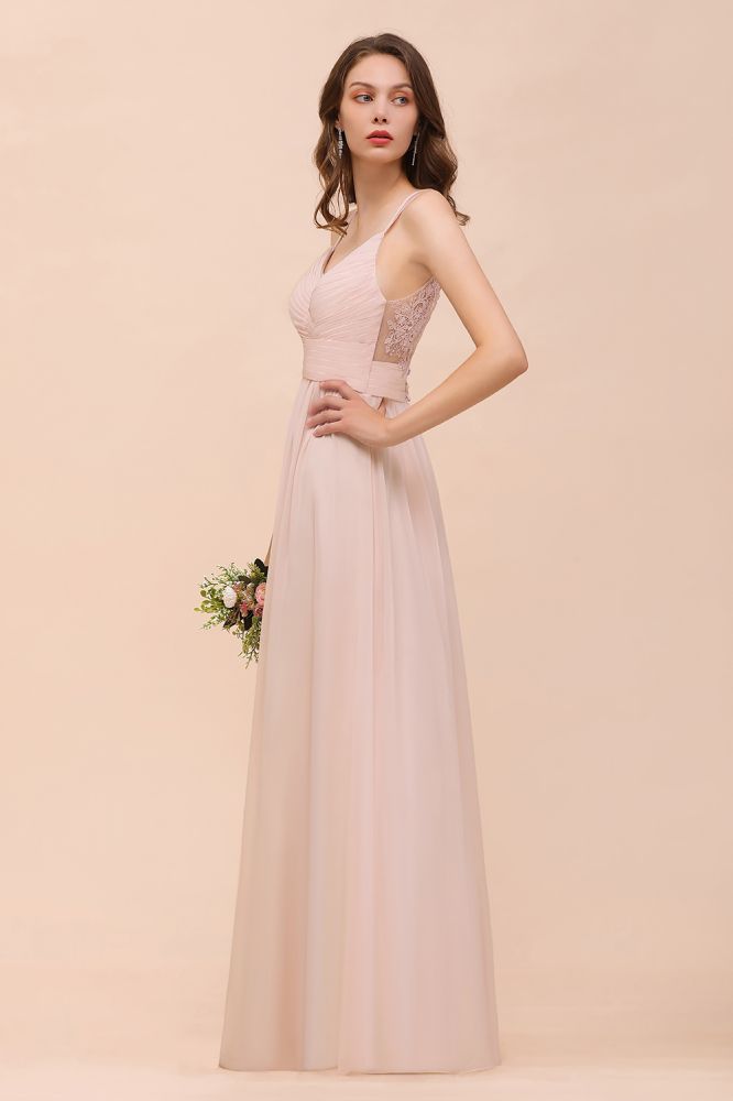 Robe de mariée rose poudré sans manches, coupe trapèze, idéale pour une invitée ou une demoiselle d'honneur de plage